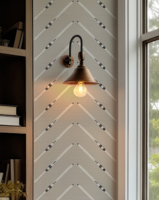 Taupe grasscloth wallpaper with natural texture and hand-drawn ski pattern
